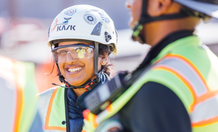smiling construction worker with helmet