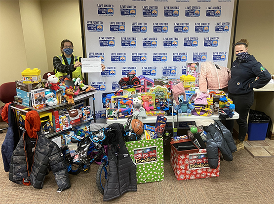 Confidential Florida Solar project team donates to United Way and Toys for Tots.