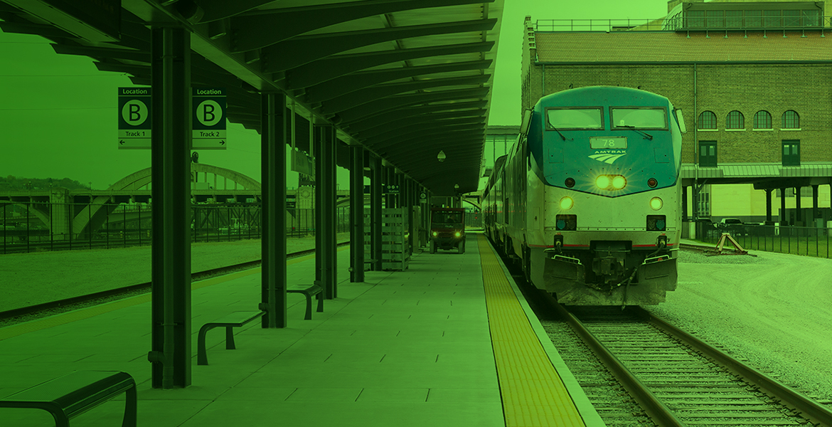 train at station with green overlay