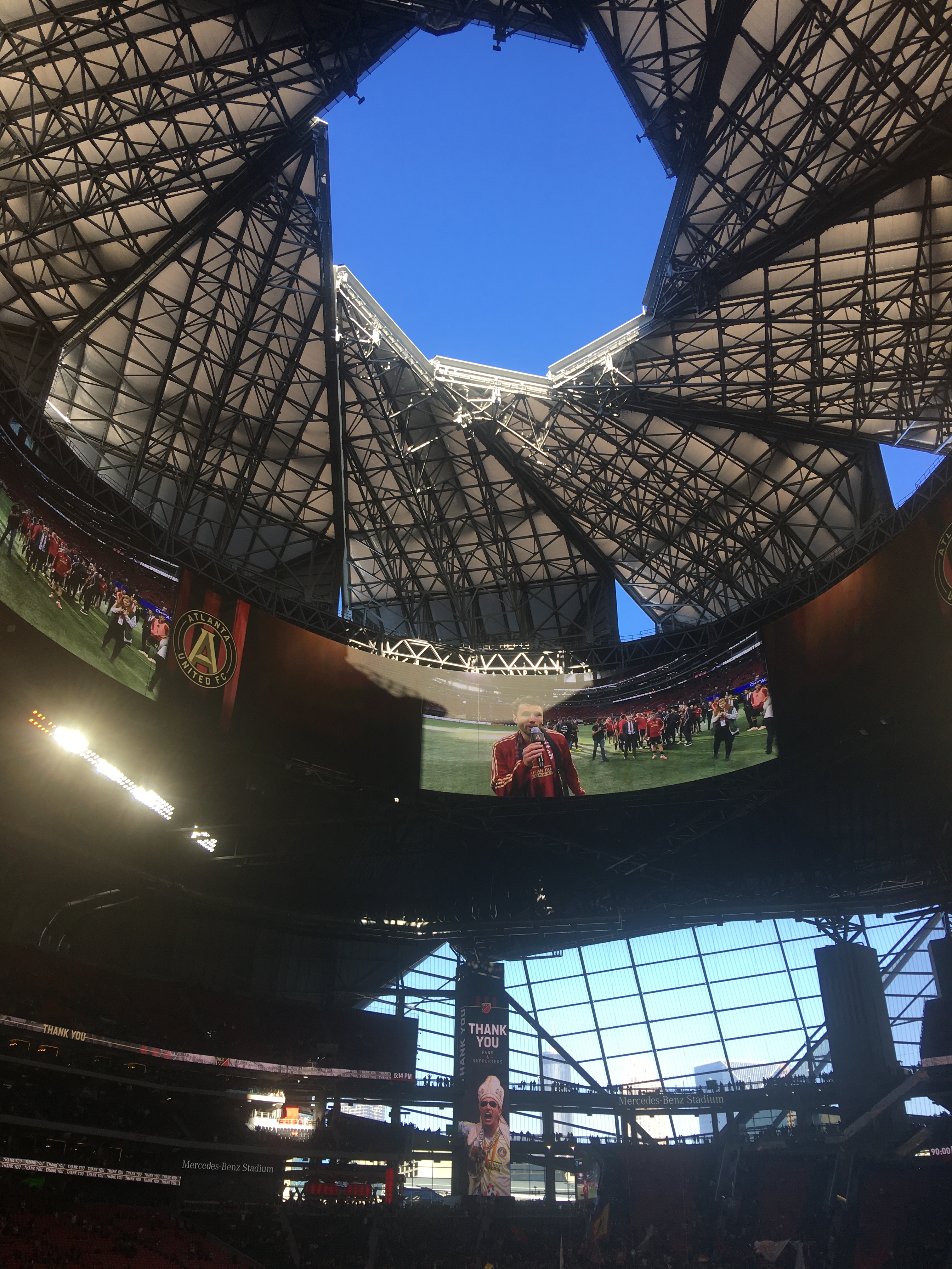 Mercedes-Benz Stadium in Atlanta, opened in August 2017 and features eight operable panels at the center of the roof. Photo Source: Eric.Jason.Cross via Wikimedia Commons