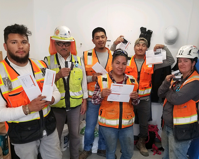 Mortenson construction workers receiving awards for safety