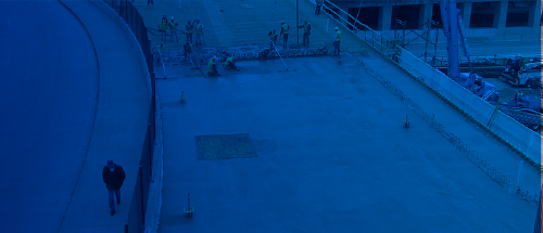blue man walking on ramp concrete pour