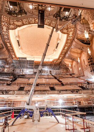 A specialty lift with a reach of 135 feet is seen inside the Arlene Schnitzer Concert Hall