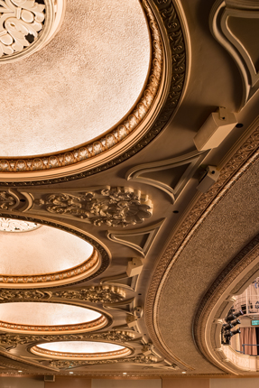 Customized speakers are seen on the historic ceiling moulding of the Arlene Schnitzer Concert Hall
