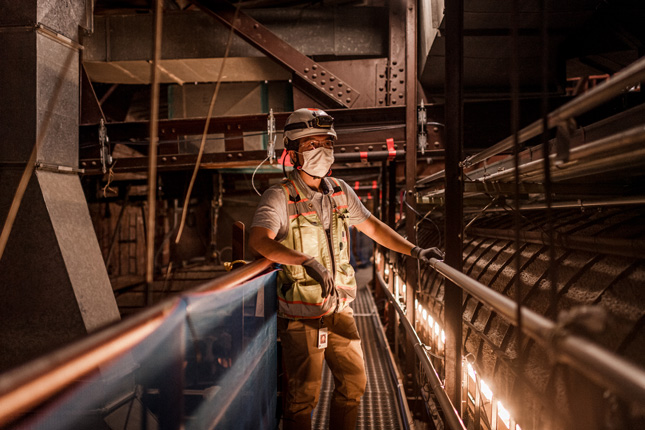 A Mortenson worker is seen on the catwalk on the backside of the Arlene Schnitzer Concert Hall