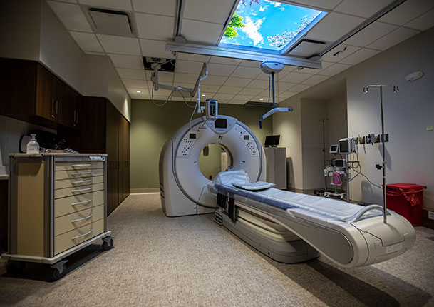 CT scan machine in room with skylight