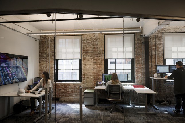 desk area in renovated warehouse to offices