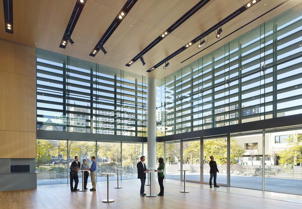 reception area in orchestra hall with large windows