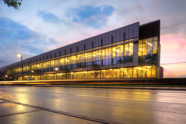 exterior of Penn State athletic center at night after construction finished