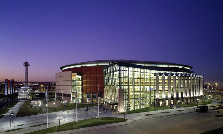 Construction of modern exterior of Pepsi Center at night