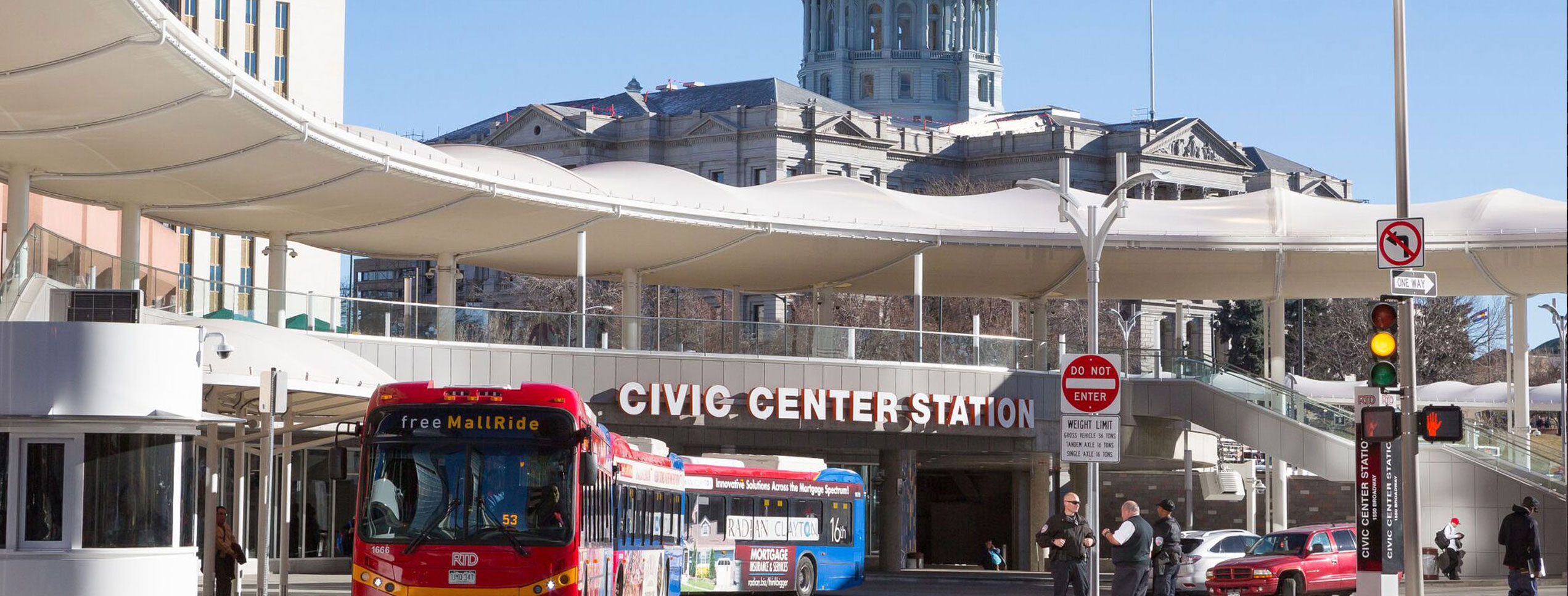Civic Center Station with bus at stoplight