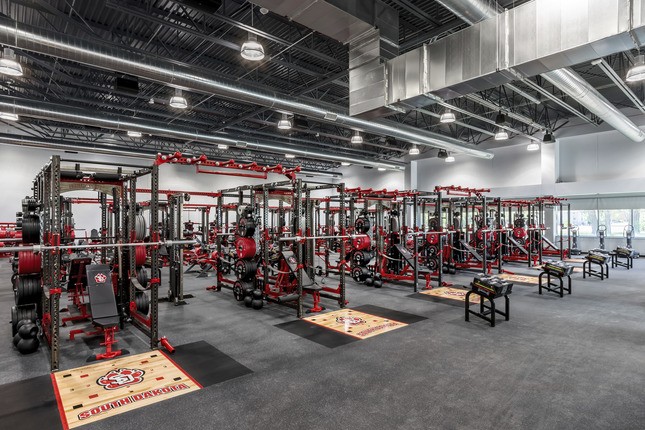 large room with weight racks