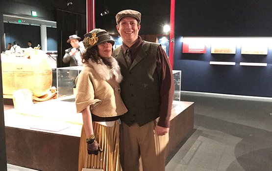  a couple dressed in 1920s costumes