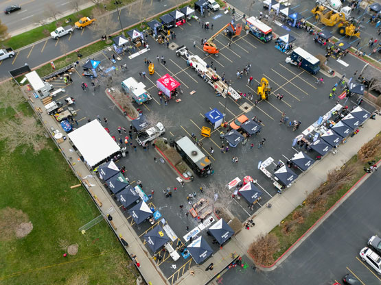 birds eye view of parking lot community event