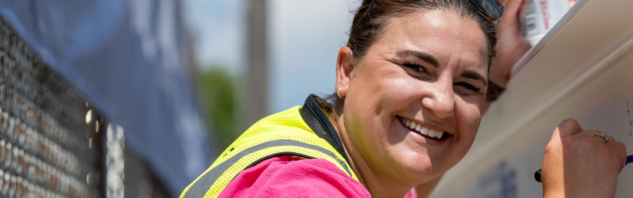 Construction worker in safety vest outdoors
