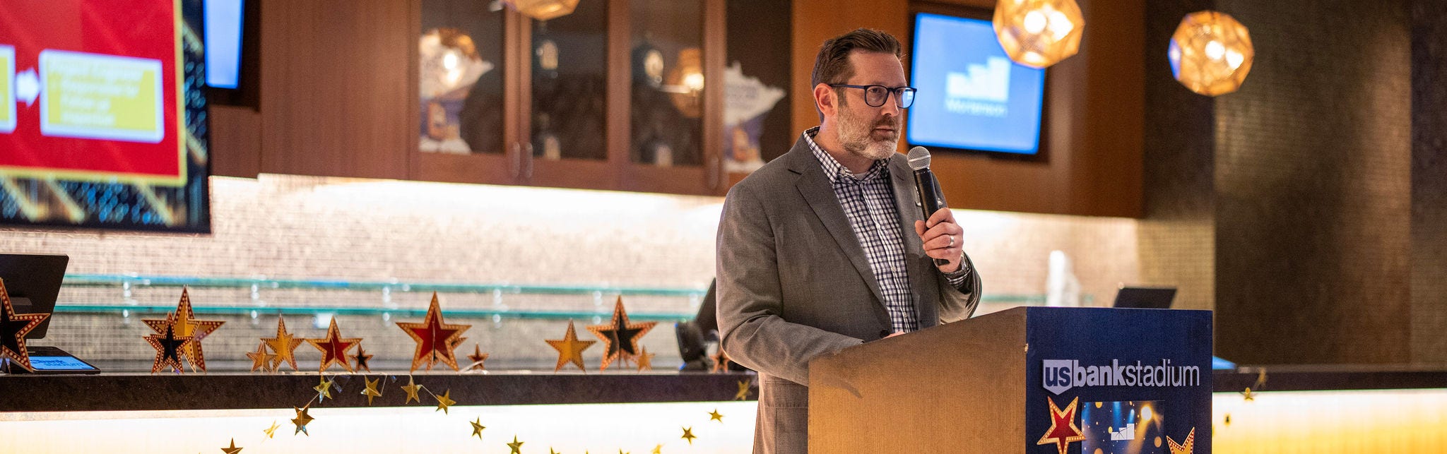 Speaker at US Bank Stadium event