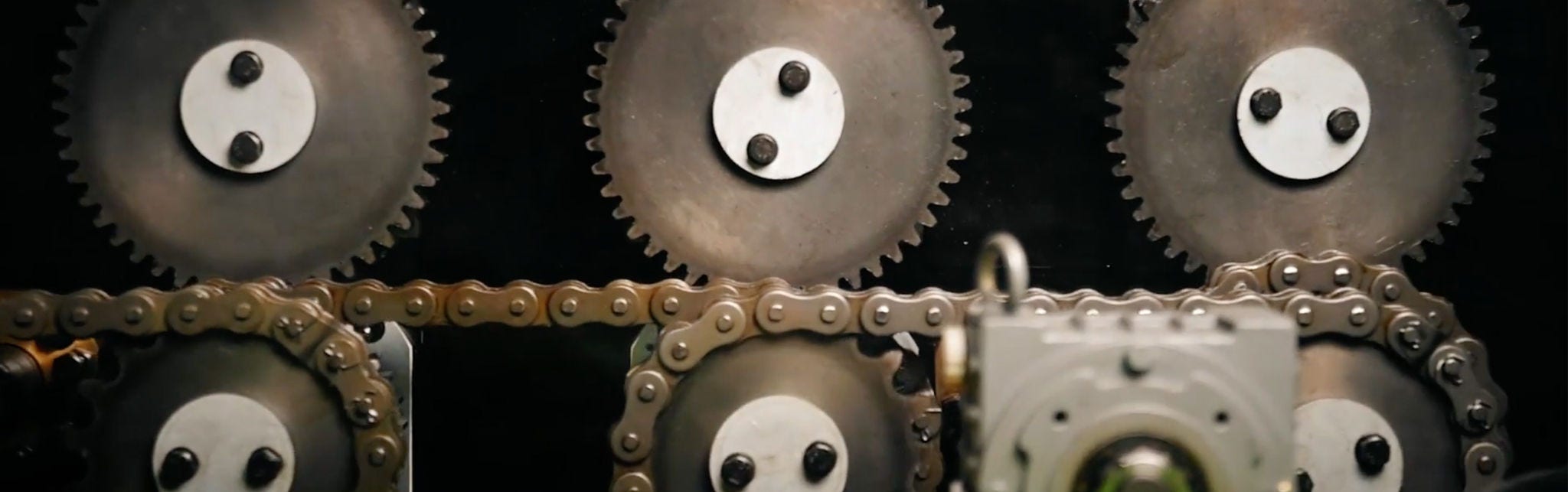 Close-up of industrial gears and chains