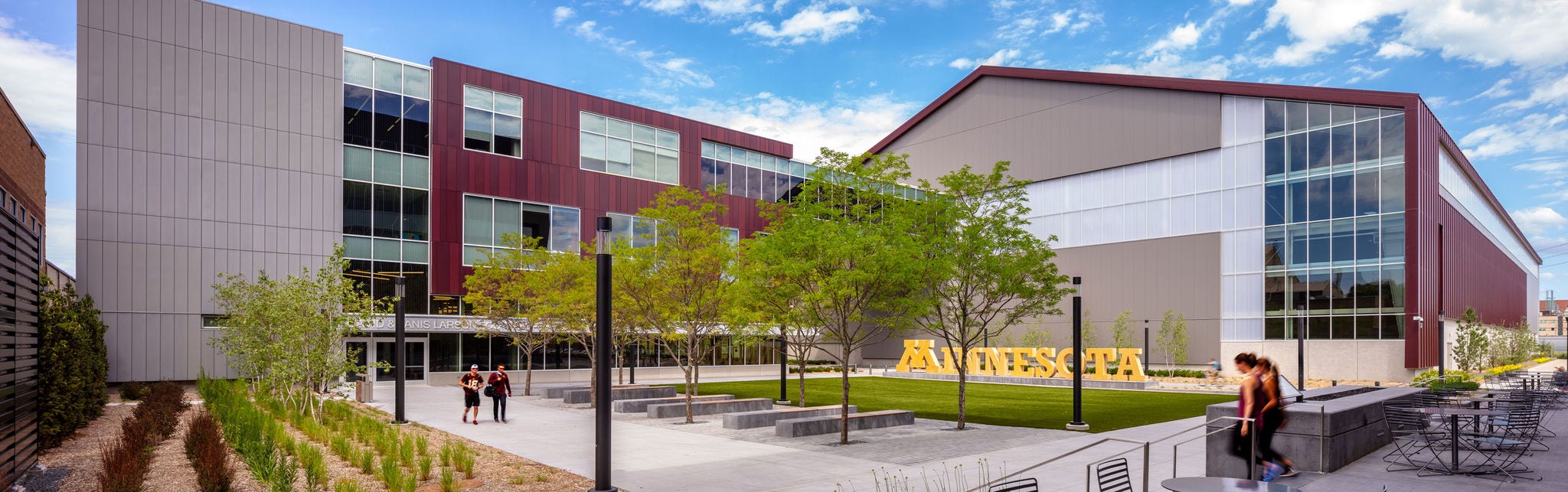 Modern campus courtyard with students outdoors