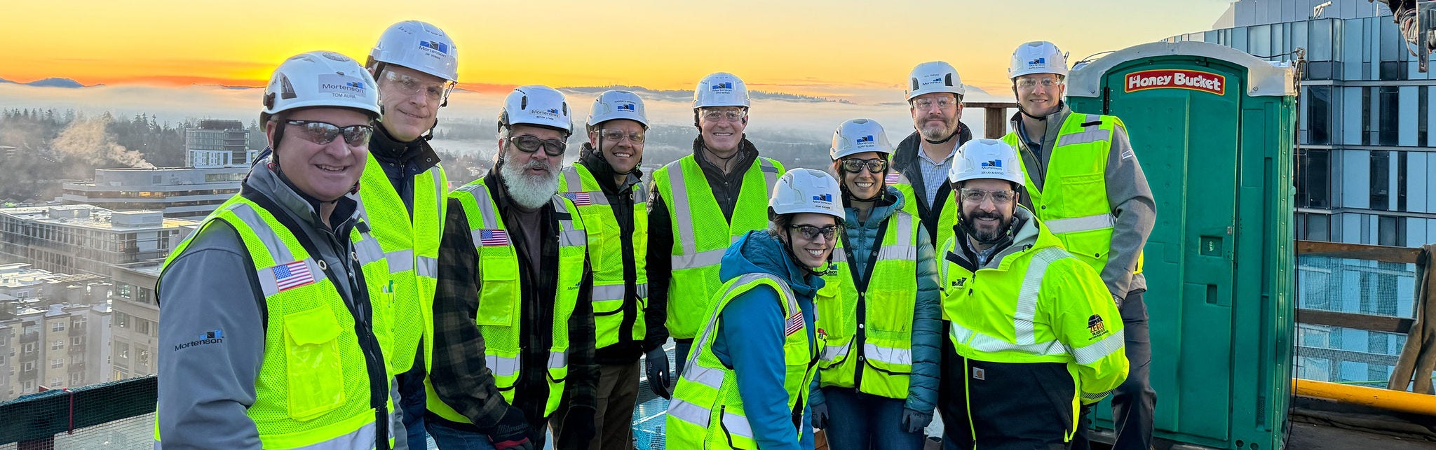Construction team at sunrise on-site