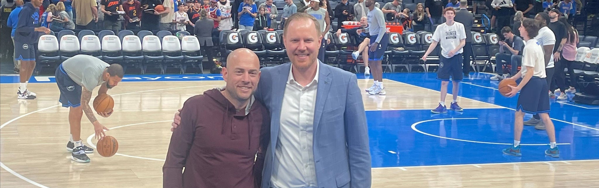 Erik Johannes, Adam Hardy at basketball game