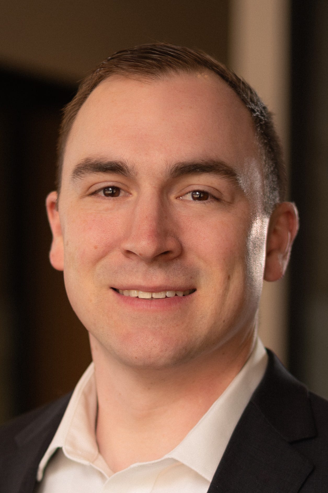 Professional man in formal attire indoors
