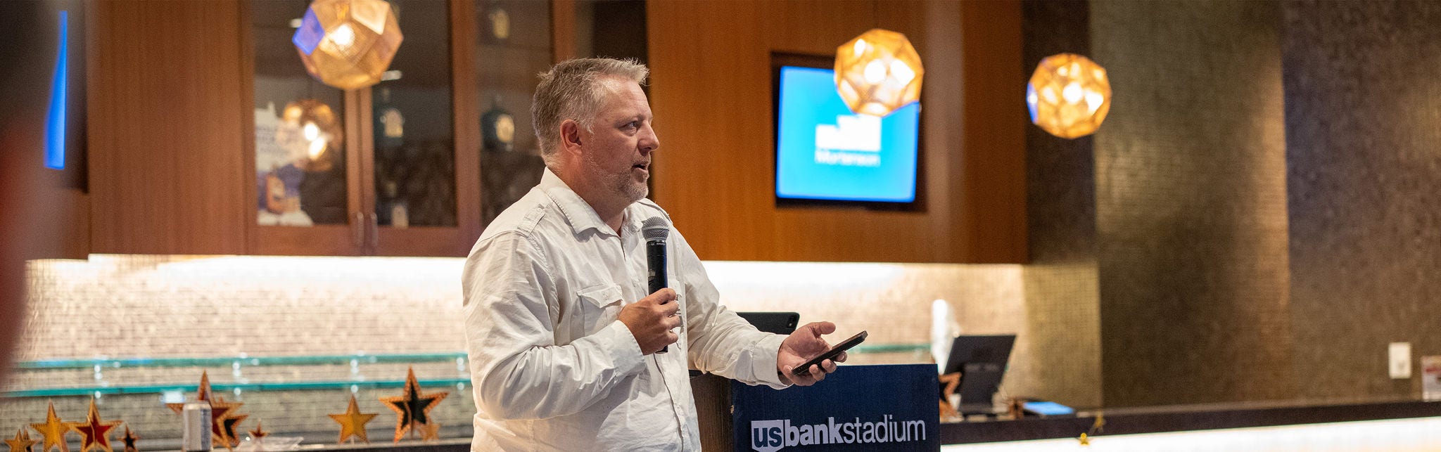 Speaker at US Bank Stadium event