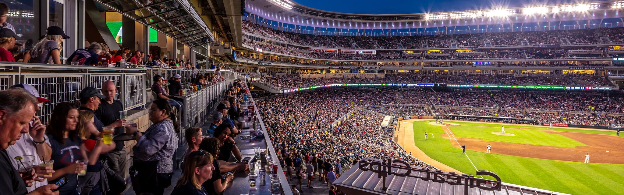 Crowded Baseball Stadium During Evening Game