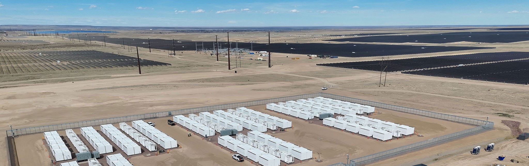 Aerial view of large solar farm and battery storage