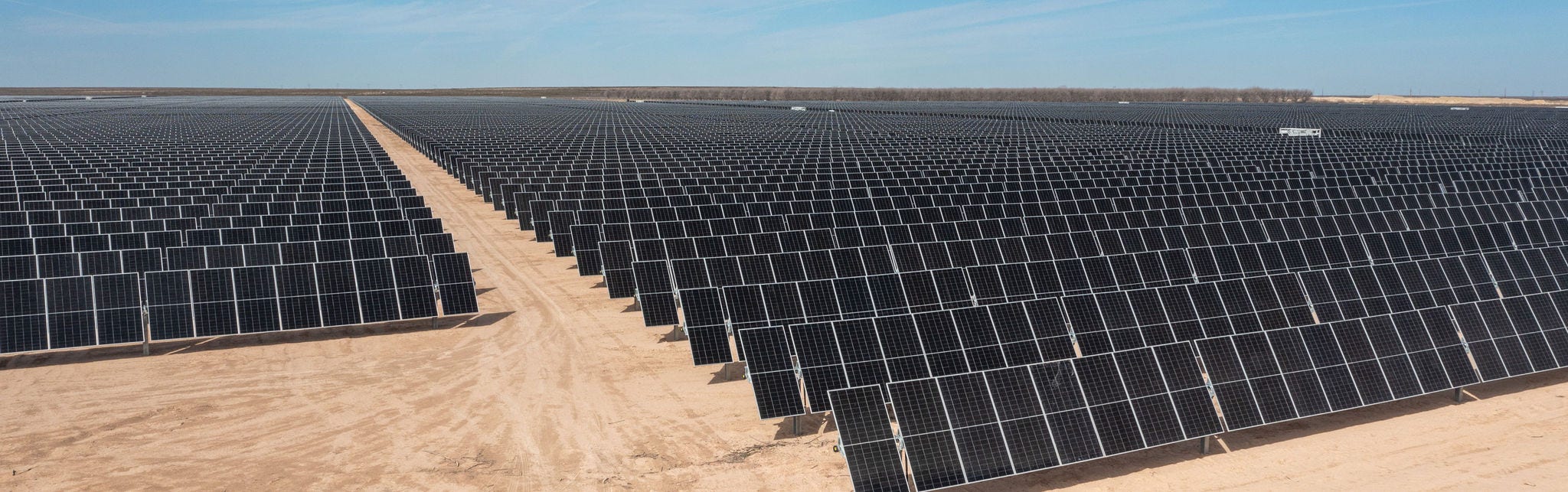 Expansive solar panel farm in desert